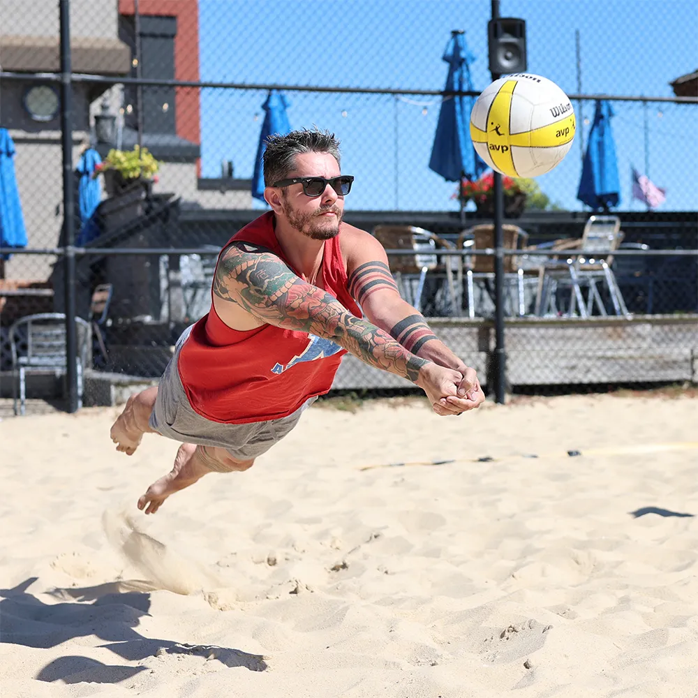 Diving Sand Volleyball Player at Pinheads in Fishers