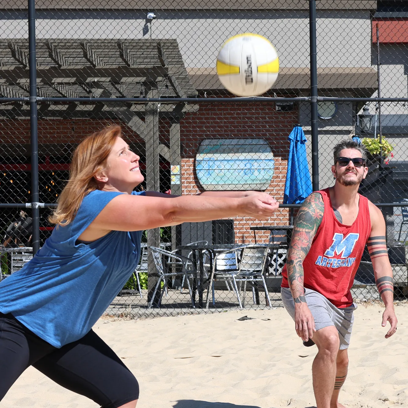 Setting up the next play in Sand Volleyball at Pinheads in Fishers